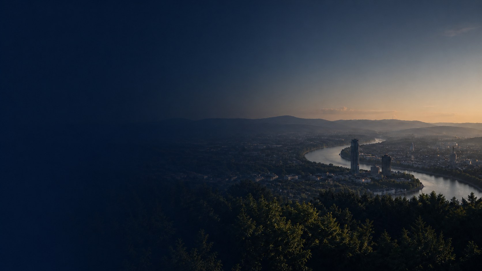 Blick über Bonn und den Rhein bei Abenddämmerung